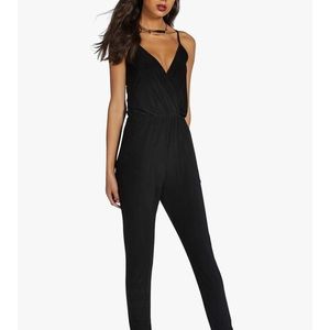 NWT black boohoo jumpsuit size 4
